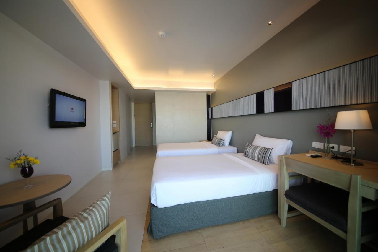 The Sun Xclusive Hotel Pattaya Quarto foto